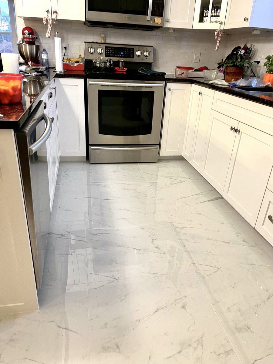 A tile floor finished by High-5 Renovations